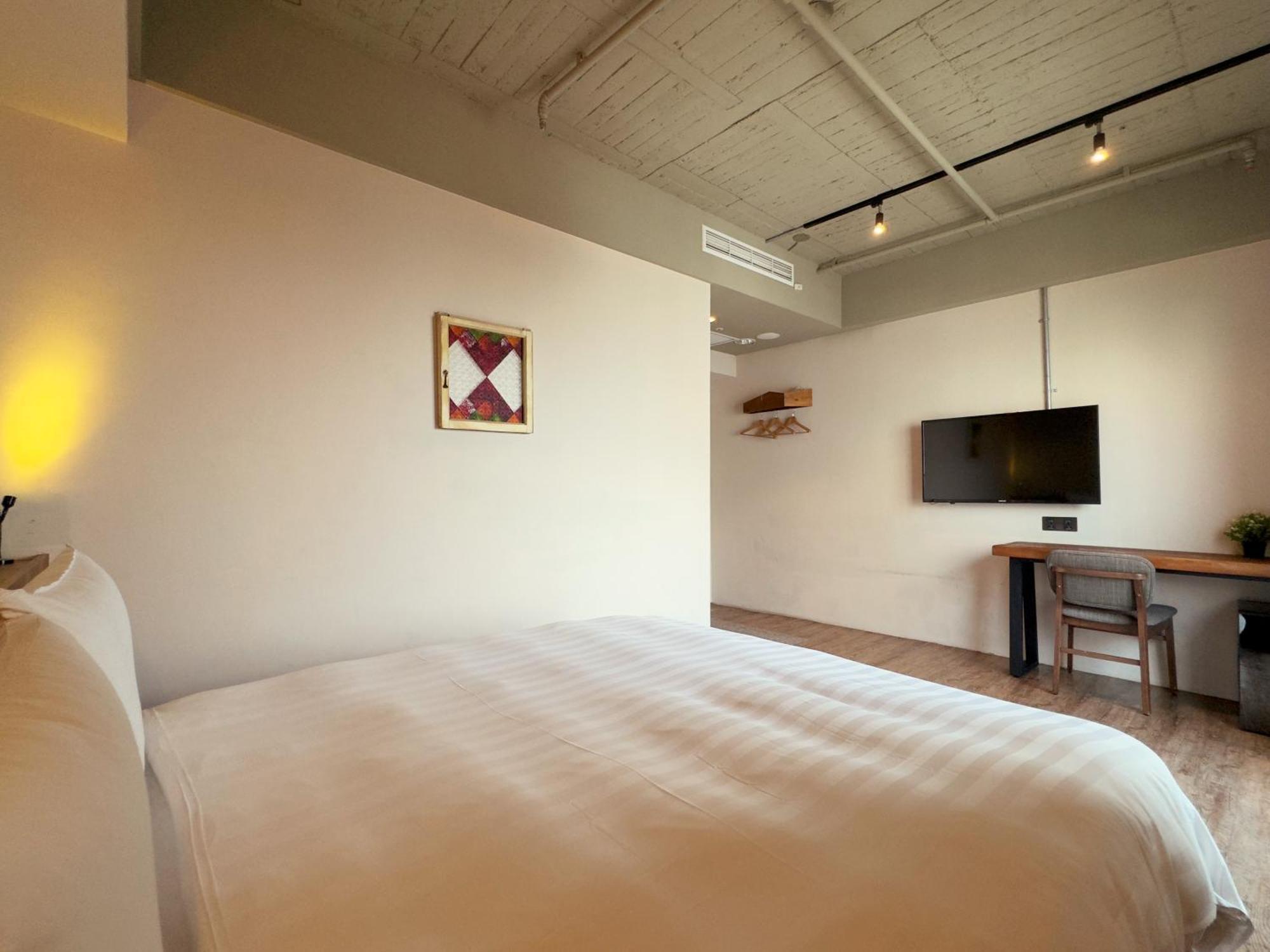 Roaders Hotel Tainan Chengda Oda fotoğraf