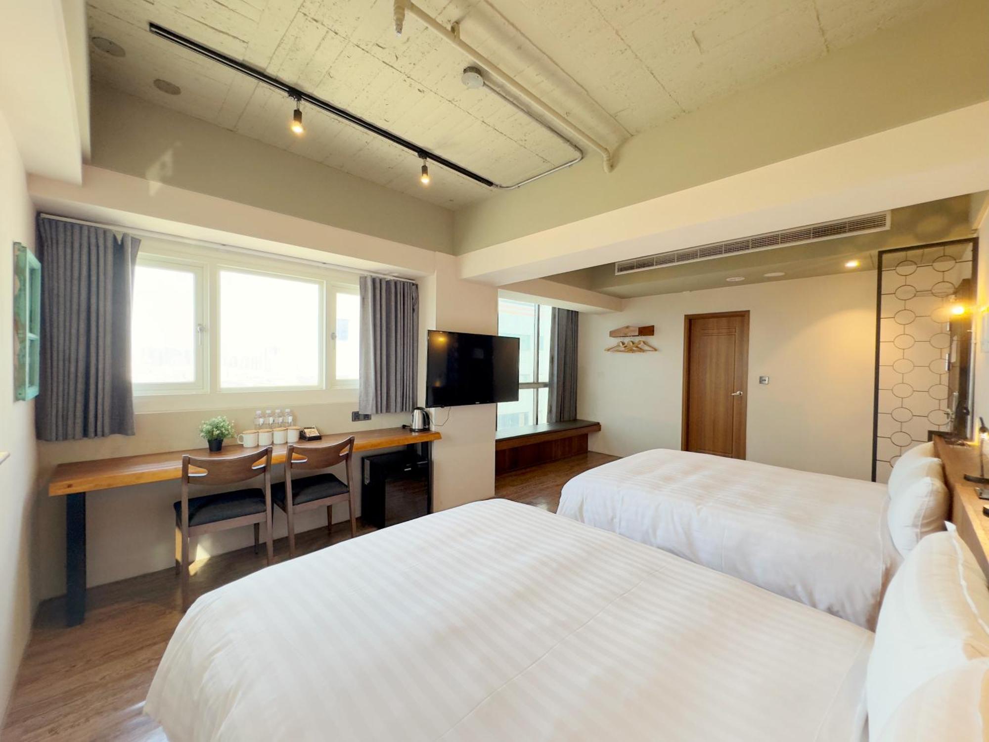 Roaders Hotel Tainan Chengda Oda fotoğraf