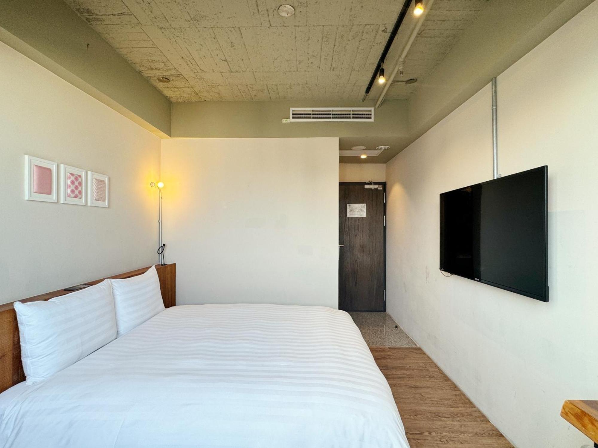Roaders Hotel Tainan Chengda Oda fotoğraf