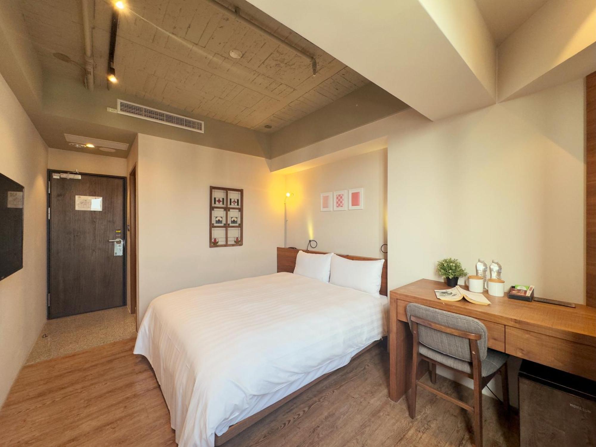 Roaders Hotel Tainan Chengda Oda fotoğraf