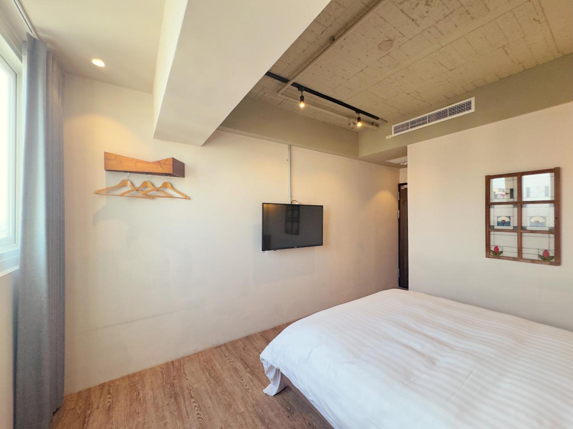 Roaders Hotel Tainan Chengda Oda fotoğraf