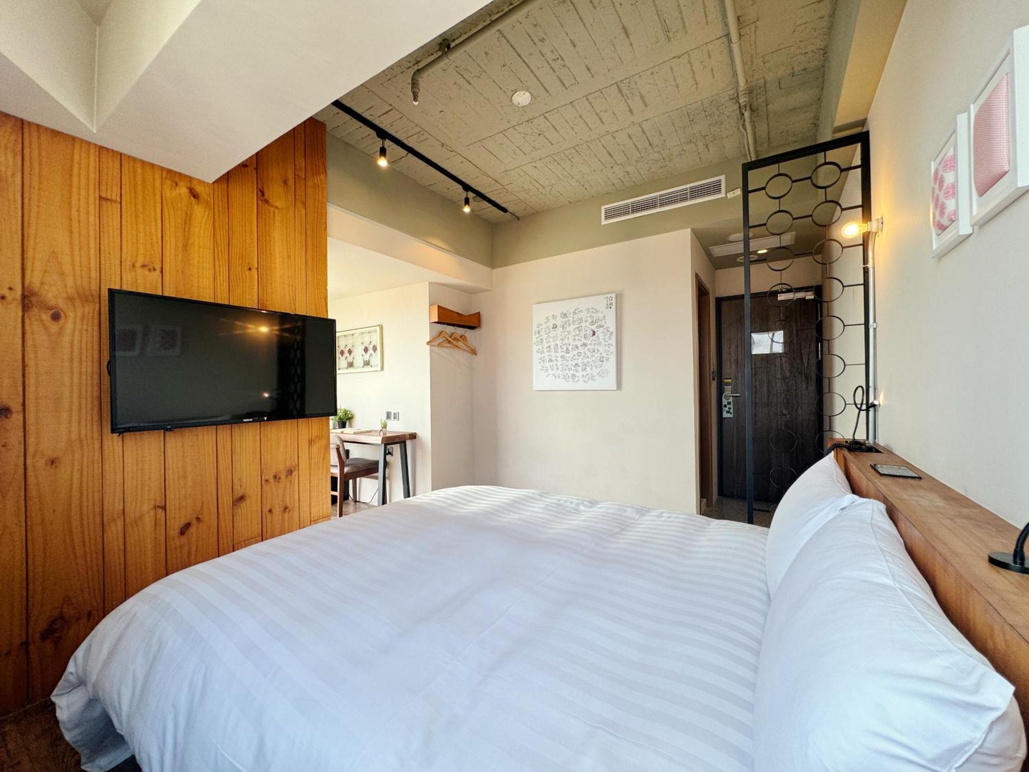 Roaders Hotel Tainan Chengda Oda fotoğraf